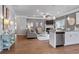 Open floor plan blending kitchen and living space with modern finishes at 14 Jacobs Farm Ln # 7, Lawrenceville, GA 30045