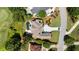 Expansive home features a large driveway, manicured lawn, and access to a nearby golf course at 1409 Spyglass Hill Dr, Johns Creek, GA 30097