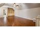 Large bonus room boasts hardwood floors and built-in shelving units at 1409 Spyglass Hill Dr, Johns Creek, GA 30097