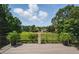 Beautiful deck overlooking a lush golf course at 1409 Spyglass Hill Dr, Johns Creek, GA 30097