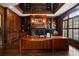 Sophisticated home office with custom wood paneling, built-in bookshelves, and large desk at 1409 Spyglass Hill Dr, Johns Creek, GA 30097