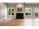 Bright room with fireplace and large windows at 1409 Spyglass Hill Dr, Johns Creek, GA 30097