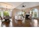 Inviting living area with a fireplace, ample seating, and elegant decor at 1409 Spyglass Hill Dr, Johns Creek, GA 30097