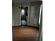 A dining room featuring built-in shelves, hardwood floors, and a chandelier at 1643 Westhaven Sw Dr, Atlanta, GA 30311
