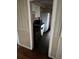 Compact kitchen with range, refrigerator, and overhead cabinets at 1643 Westhaven Sw Dr, Atlanta, GA 30311