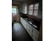Vintage kitchen with ample cabinetry and a double basin sink at 1643 Westhaven Sw Dr, Atlanta, GA 30311