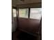 Enclosed porch with multiple windows and wood paneling at 1643 Westhaven Sw Dr, Atlanta, GA 30311