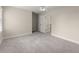 Bedroom featuring neutral walls, plush carpet, ceiling fan, and closet for storage at 3040 Larkspur Ct, Cumming, GA 30041