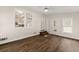 Charming sunroom with large windows, hardwood floors, and access to the outdoors, providing a serene retreat at 3040 Larkspur Ct, Cumming, GA 30041