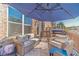 Charming deck area with patio seating, grill, and plenty of sunlight for relaxing and entertaining at 3080 Westpoint Cir, Snellville, GA 30078