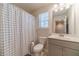 Tidy bathroom with a shower and tub combination and ample counter space at 3080 Westpoint Cir, Snellville, GA 30078