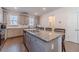 Bright and spacious kitchen with granite counters, stainless appliances, and seating perfect for food preparation at 3080 Westpoint Cir, Snellville, GA 30078