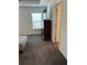 Bedroom with a window, tv, dark wood furniture, neutral walls, and plush gray carpet at 409 Ruths Blvd, Woodstock, GA 30188