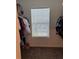 Walk-in closet with ample storage and natural light from the window at 409 Ruths Blvd, Woodstock, GA 30188