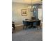 Well-lit dining area with a round table, four chairs, and stylish light fixture at 409 Ruths Blvd, Woodstock, GA 30188