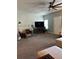 Inviting living area featuring an entertainment center and comfortable seating at 409 Ruths Blvd, Woodstock, GA 30188
