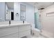 Modern bathroom features dual sinks, sleek fixtures, and a step-in shower at 845 Lake Hollow Sw Blvd, Marietta, GA 30064