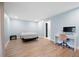 Light-filled bedroom features modern floors and recessed lighting at 845 Lake Hollow Sw Blvd, Marietta, GA 30064
