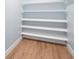 Walk-in closet with built-in shelving, providing ample storage space for organized living at 845 Lake Hollow Sw Blvd, Marietta, GA 30064