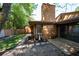 Exterior view of a home with a fenced backyard featuring artificial turf and stone pavers, perfect for outdoor enjoyment at 845 Lake Hollow Sw Blvd, Marietta, GA 30064
