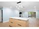 Open living area featuring a bright kitchen, access to the backyard, and recessed lighting at 845 Lake Hollow Sw Blvd, Marietta, GA 30064