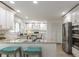 Bright kitchen with stainless steel appliances and granite countertops at 110 Fairway Ridge Dr, Johns Creek, GA 30022