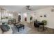 Open-concept living room connected to modern kitchen with peninsula at 110 Fairway Ridge Dr, Johns Creek, GA 30022