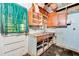 View of a kitchen area, needing remodeling, featuring cabinetry and a sink area at 2180 Rexford Dr, Decatur, GA 30034