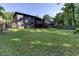 A large, green lawn and trees add to the beauty of this backyard at 3193 Trasher Cir, Decatur, GA 30032