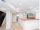 This finished basement includes recessed lighting, a bar area, and stairs to the upper level at 3193 Trasher Cir, Decatur, GA 30032