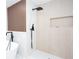 Stylish bathroom showcasing a sleek walk-in shower with a rainfall showerhead and a freestanding tub at 3193 Trasher Cir, Decatur, GA 30032