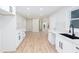 Modern kitchen with white cabinets, quartz countertops, and stainless steel appliances at 3193 Trasher Cir, Decatur, GA 30032