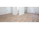 Spacious living room features light-colored flooring, neutral paint, and doorways to other rooms at 3193 Trasher Cir, Decatur, GA 30032