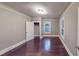 Bedroom with hardwood floors, natural light, neutral walls, and closet at 1100 Welch Sw St, Atlanta, GA 30310