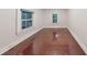Bright room with hardwood floors and natural light from two windows creating a welcoming space at 1100 Welch Sw St, Atlanta, GA 30310