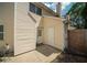 Home's exterior features a small back patio, siding and a door at 1507 Paces Ferry North Se, Smyrna, GA 30080