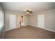 Spacious bedroom with neutral walls and ceiling fan at 1507 Paces Ferry North Se, Smyrna, GA 30080