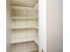 Walk-in closet featuring multi-level shelving with carpet at 1507 Paces Ferry North Se, Smyrna, GA 30080
