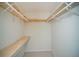 Walk-in closet featuring built in shelving and carpeted floors at 1507 Paces Ferry North Se, Smyrna, GA 30080