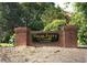Paces Ferry North Townhomes sign surrounded by lush greenery at 1507 Paces Ferry North Se, Smyrna, GA 30080