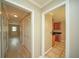 Bright hallway features hardwood floors and access to multiple rooms at 1507 Paces Ferry North Se, Smyrna, GA 30080