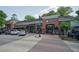 Brick building features a variety of dining options and outdoor seating areas at 1507 Paces Ferry North Se, Smyrna, GA 30080