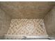 Shower floor showcasing decorative tile and drain at 1507 Paces Ferry North Se, Smyrna, GA 30080
