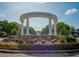 Smyrna Market Village entrance with manicured landscaping and architectural details at 1507 Paces Ferry North Se, Smyrna, GA 30080