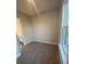 Cozy carpeted bedroom with natural light from the window at 3730 Reserve Overlook (Lot 8) Way, Cumming, GA 30041