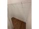 Walk-in closet with white walls, wooden floors, and hanging rack at 3730 Reserve Overlook (Lot 8) Way, Cumming, GA 30041