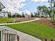 Spacious lot with landscaping and trees, accentuating the property's generous space and natural beauty at 3730 Reserve Overlook (Lot 8) Way, Cumming, GA 30041