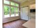 Breakfast area with views from multiple windows, alongside modern cabinets and stainless steel appliances at 3730 Reserve Overlook (Lot 8) Way, Cumming, GA 30041