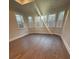 Sun-filled main bedroom boasts hardwood floors and bright windows at 3730 Reserve Overlook (Lot 8) Way, Cumming, GA 30041