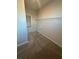 Spacious walk-in closet with wire shelving and neutral carpeting providing ample storage at 3730 Reserve Overlook (Lot 8) Way, Cumming, GA 30041